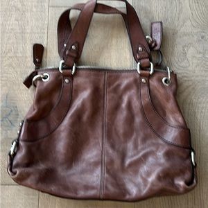 Fossil leather bag.